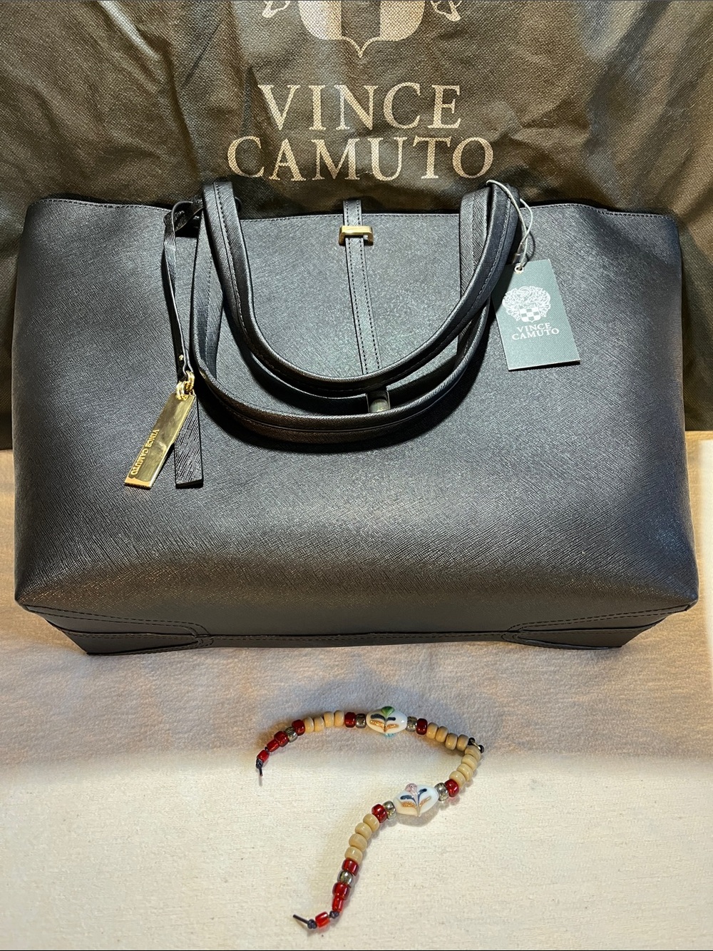 Vince Camuto Black Saffiano Tote with Gold Accent. (P-31)